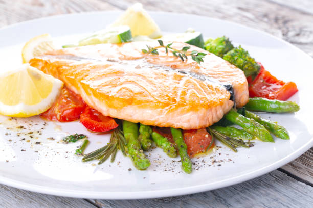 istock Grilled salmon steak butterfly with vegetables 1218188699
