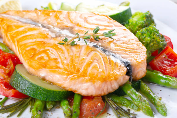 istock Grilled salmon steak butterfly with vegetables 1218188704