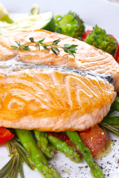 istock Grilled salmon steak butterfly with vegetables 1218188705