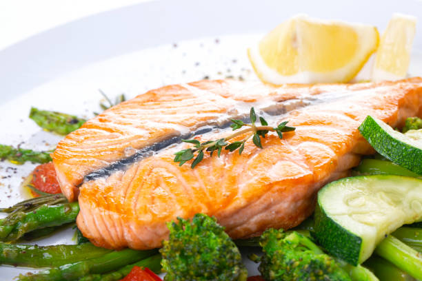 istock Grilled salmon steak butterfly with vegetables 1218188707