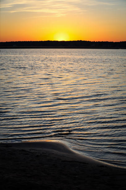 istock Yellow sunset view on late evening near river Lielupe. 1218188955