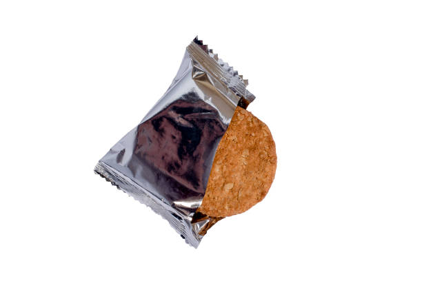 istock Cookies with cereals in an open package on a white background are isolated. 1218191837
