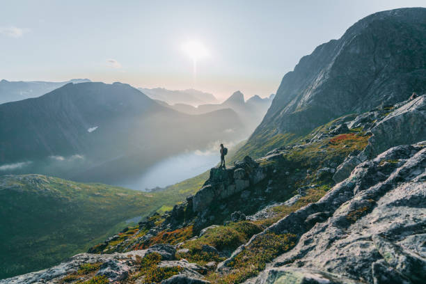 istock Man hiking in mountain on Senja island 1218195476