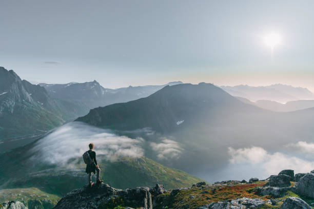 istock Man hiking in mountain on Senja island 1218195480