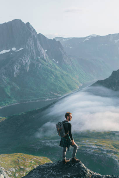 istock Man hiking in mountain on Senja island 1218195484
