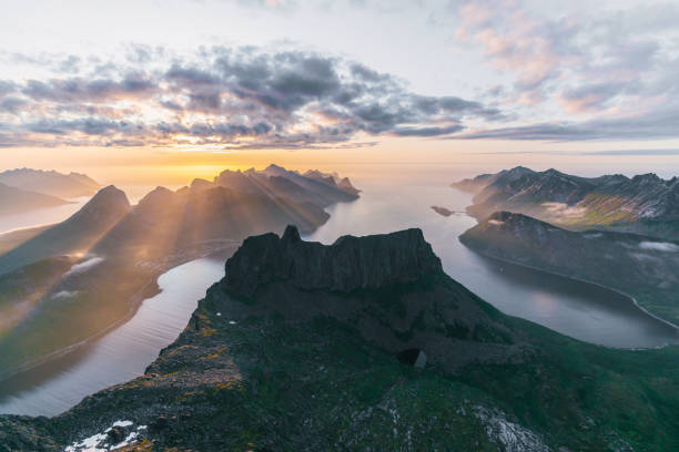Scenic view on Senja Island from mountains Scenic view on Senja Island from mountains at sunset senja island photos stock pictures, royalty-free photos & images