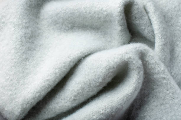 istock pastel blue soft background from plush fabric with folds on its surface 1218198938