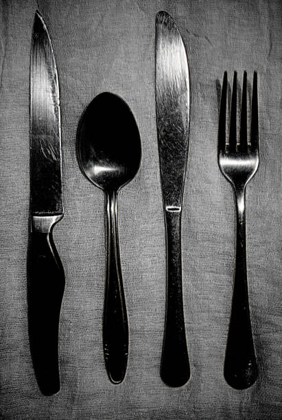 istock Fork, knife and spoon lie on the tablecloth 1218199171