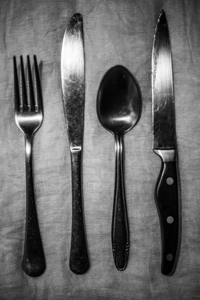 istock Fork, knife and spoon lie on the tablecloth 1218199361