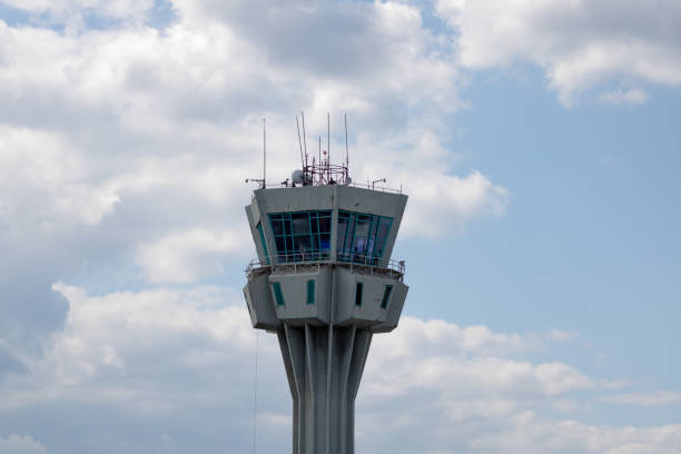 istock airport control tower on cloudy sky 1218199981
