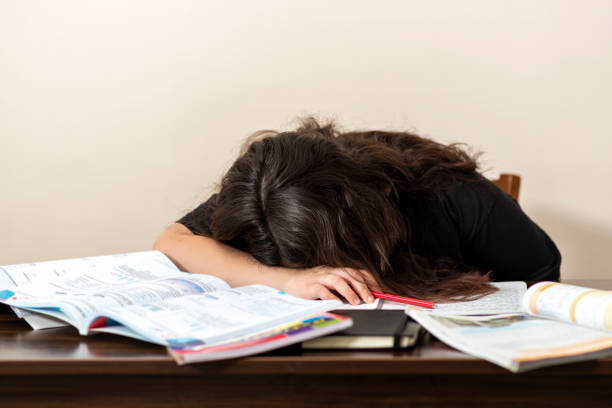 istock young girl tired of studying 1218200007