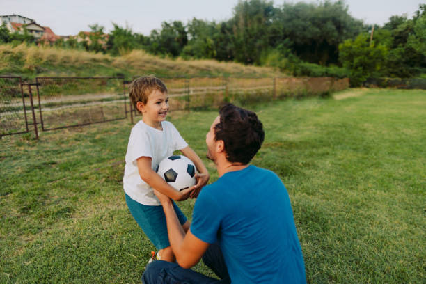 istock Father and son on a soccer court 1218200486