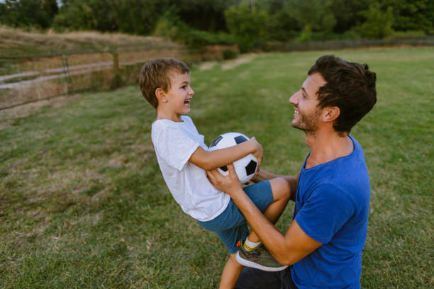 istock Father and son on a soccer court 1218200488