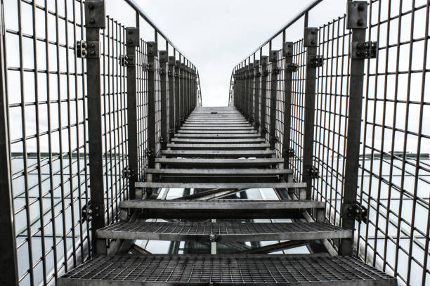 istock metal iron stairs construction up dangerous unstable railing 1218200571