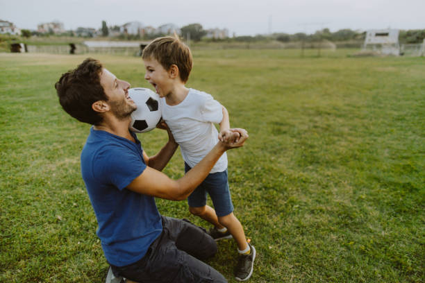 istock Father and son on a soccer court 1218201402