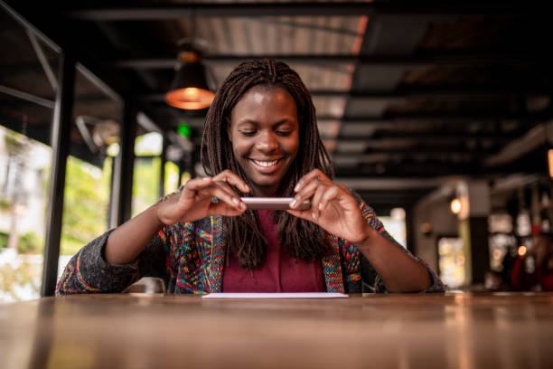 istock Check remote deposit capture at coffee shop 1218202873