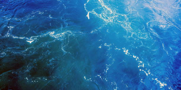 istock sea surface in dramatic dark color top view 1218203098