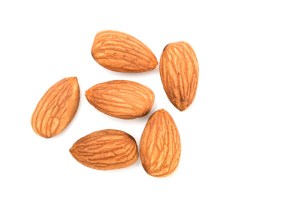 istock Top view flat lay almond isolated on white background. 1218205091