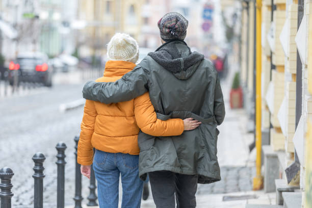 istock Rear view of couple embracing 1218205935