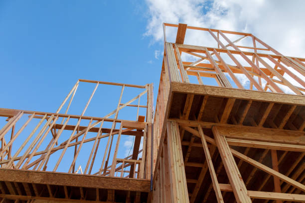 istock New home construction framing of a house 1218206432