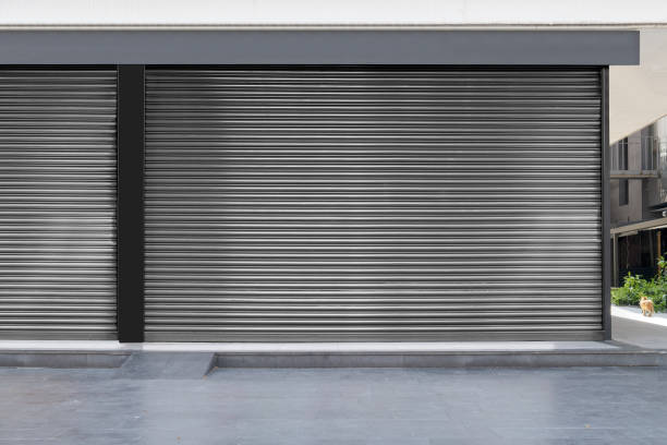 istock Closed Shop With Metal Roller Shutter Door. 1218208823