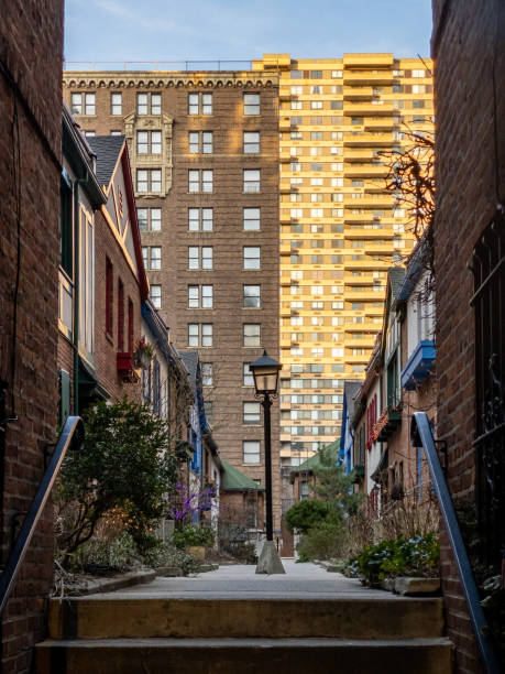 Pomander Walk - New York City Pomander Walk, a cooperative apartment complex in Manhattan, New York City, located on the Upper West Side between Broadway and West End Avenue in New York City. scent container stock pictures, royalty-free photos & images