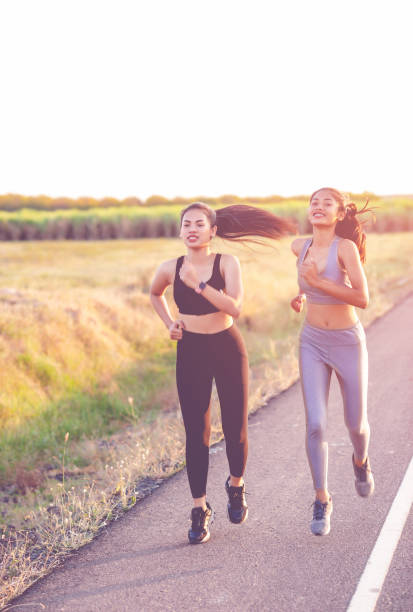 istock Women exercise happily for good health. Exercise concept 1218210662