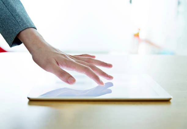 istock Woman hand toching digital tablet 1218213105