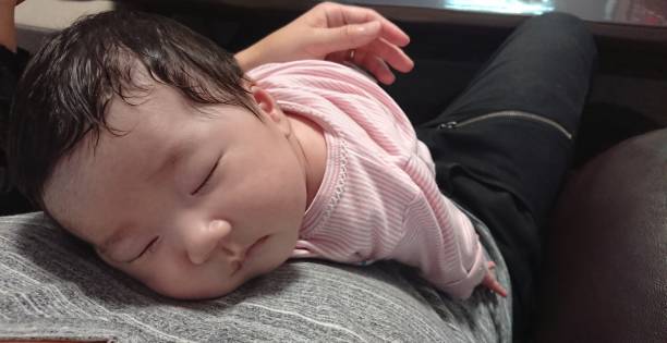 baby sleeping on the stomach