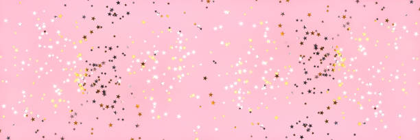 istock Golden and silver stars on pink pastel background. 1218213358