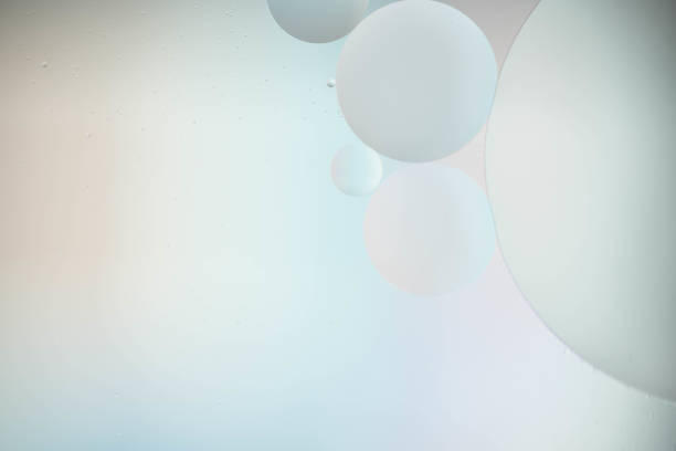 istock oil drop on water for modern and creation colorful background. 1218214877