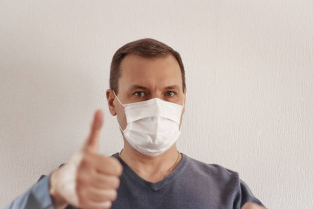 istock Medical Mask Employee 1218216048