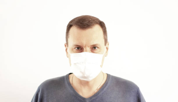 istock Medical Mask Employee 1218216118