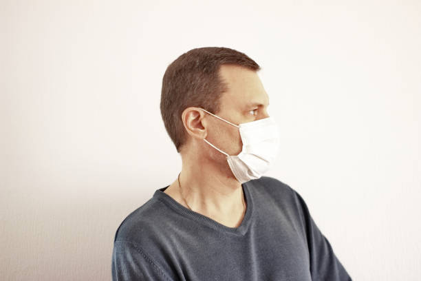 istock Medical Mask Employee 1218216486