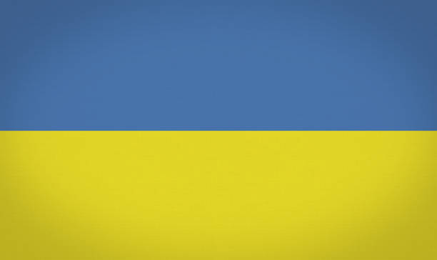 Ukrainian flag background. Fabric texture flag. stock photo