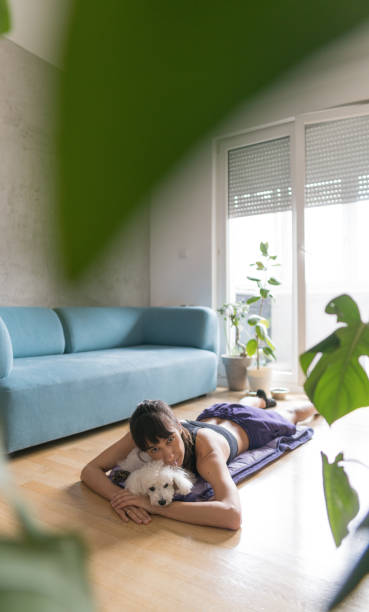 istock Cuddling with dog after workout at home 1218223693