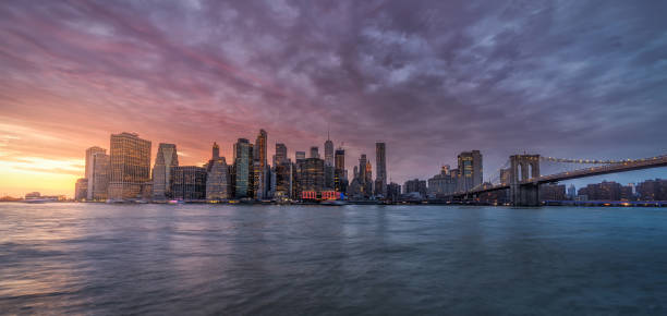 istock New york skyline reflection on the Hudson river at Brooklyn bridge at sunset 1218223871