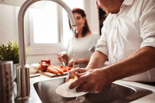istock all together blocked in house doing the chores 1218224089