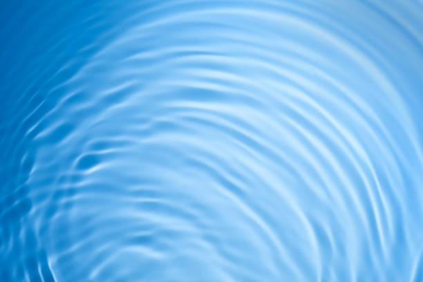 istock Clear transparent water cosmetic blue grey gel tonic multi-colored background 1218225568