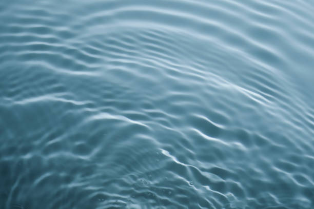 istock Clear transparent water cosmetic blue grey gel tonic multi-colored background 1218226112