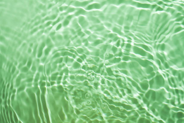istock Turquoise green transparent water cosmetic gel tonic multi-colored background 1218226485