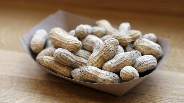 istock Plenty of Unpeeled Raw Peanuts Served as an Appetizer 1218226578