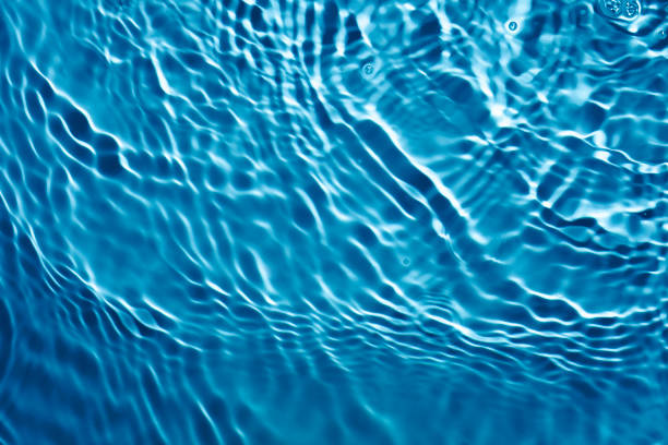 istock Clear transparent water cosmetic blue grey gel tonic multi-colored background 1218226686
