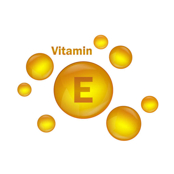 istock Vitamin E gold drop icon. Vitamin drop pill capsule health treatment. Vitamin E natural essence for skin. Vector illustration. 1218227563