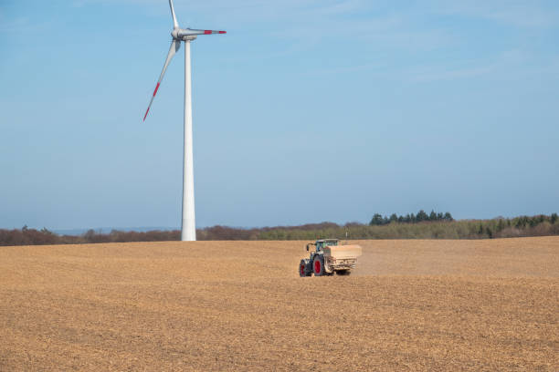 istock tractor loaded with seed delivers the seed 1218228951