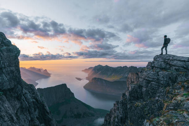 istock Man hiking in mountain on Senja island 1218230245
