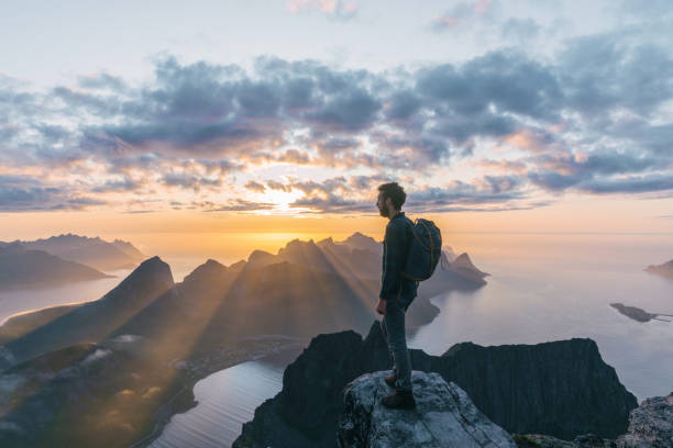 istock Man hiking in mountain on Senja island 1218230251