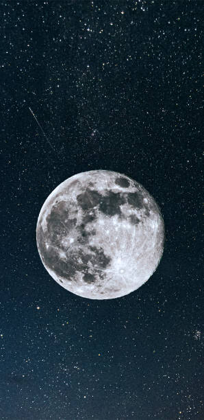 istock Full Moon in Night Sky with Stars and Meteor 1218230253