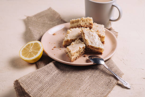 istock Cottage cheese cheesecake slices on a plate, breakfast with tea and lemon, side view 1218232074