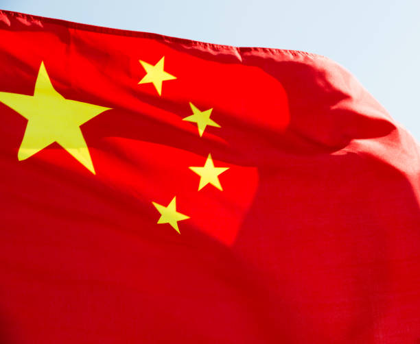 istock Closeup of waving China flag 1218232236